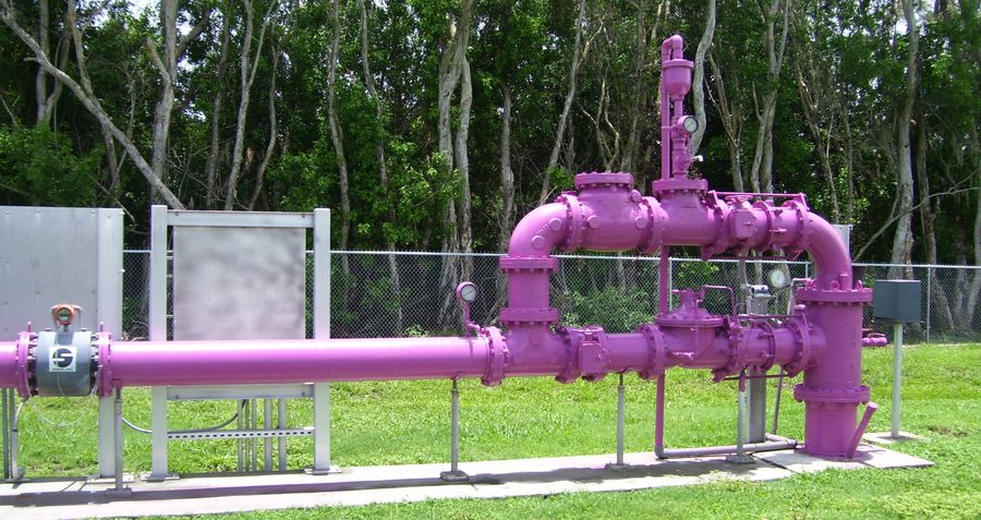 Reclaimed-water ASR wellhead, its pipework painted the purple used for reclaimed water