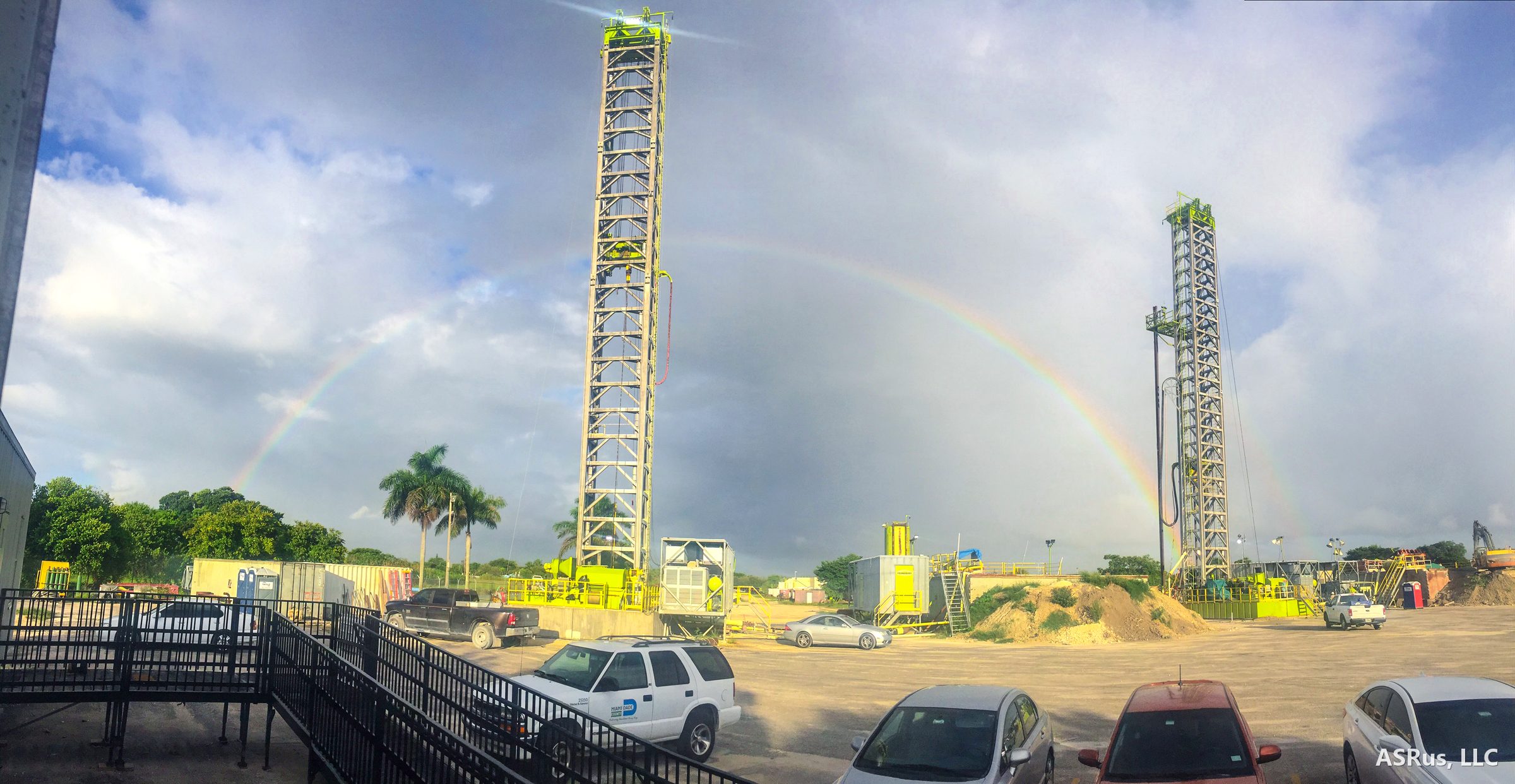 Rainbow over two drill rigs at a Class V exploratory injection well site