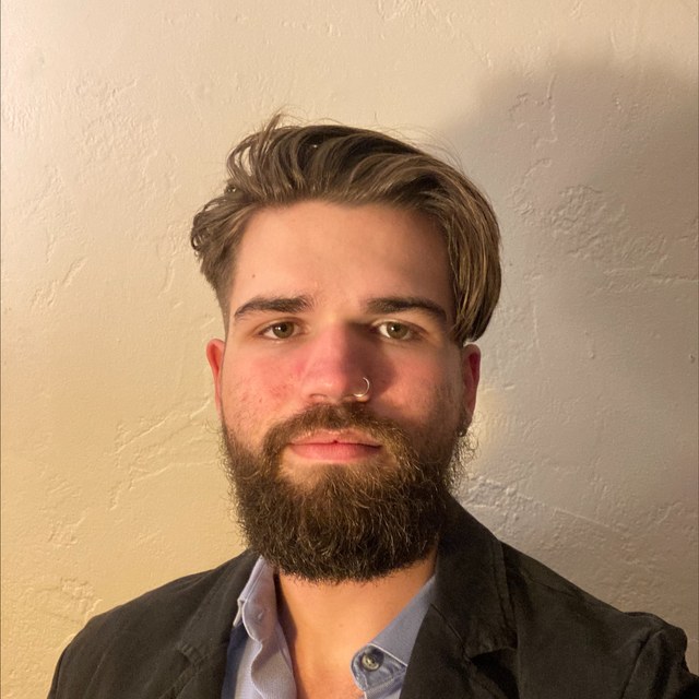 Headshot of Eli Prescott